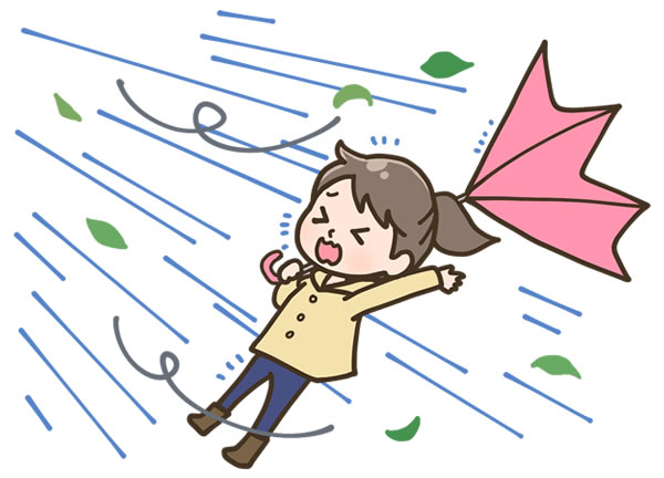 強風に煽られる女性のイラスト