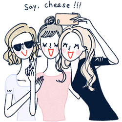 仲良く写真を撮る女性たちのイラスト